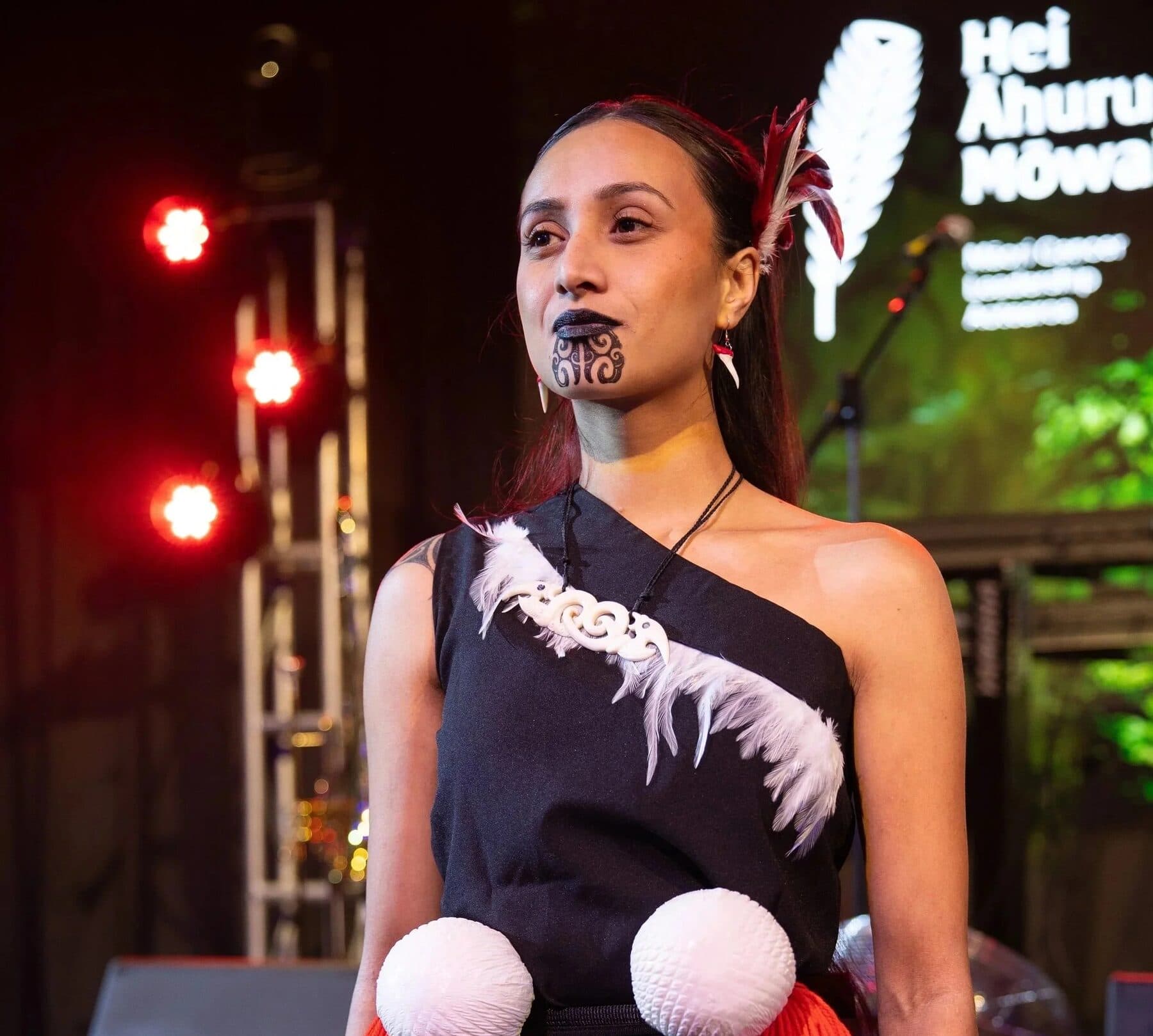A performer on stage at the World Indigenous Cancer Conference, Tāmaki Makaurau, April 2026